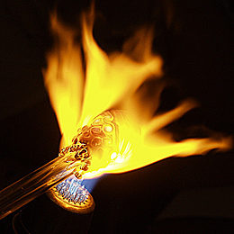 glass in torch flame